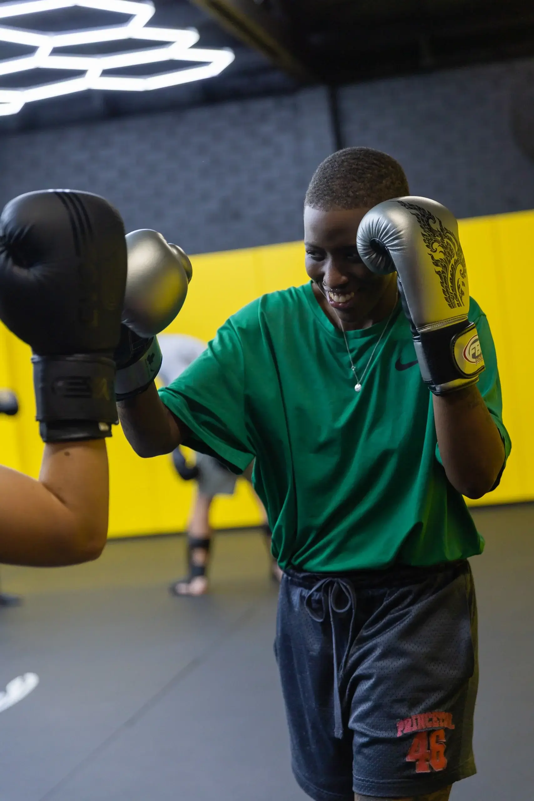 Members working focus mitts together