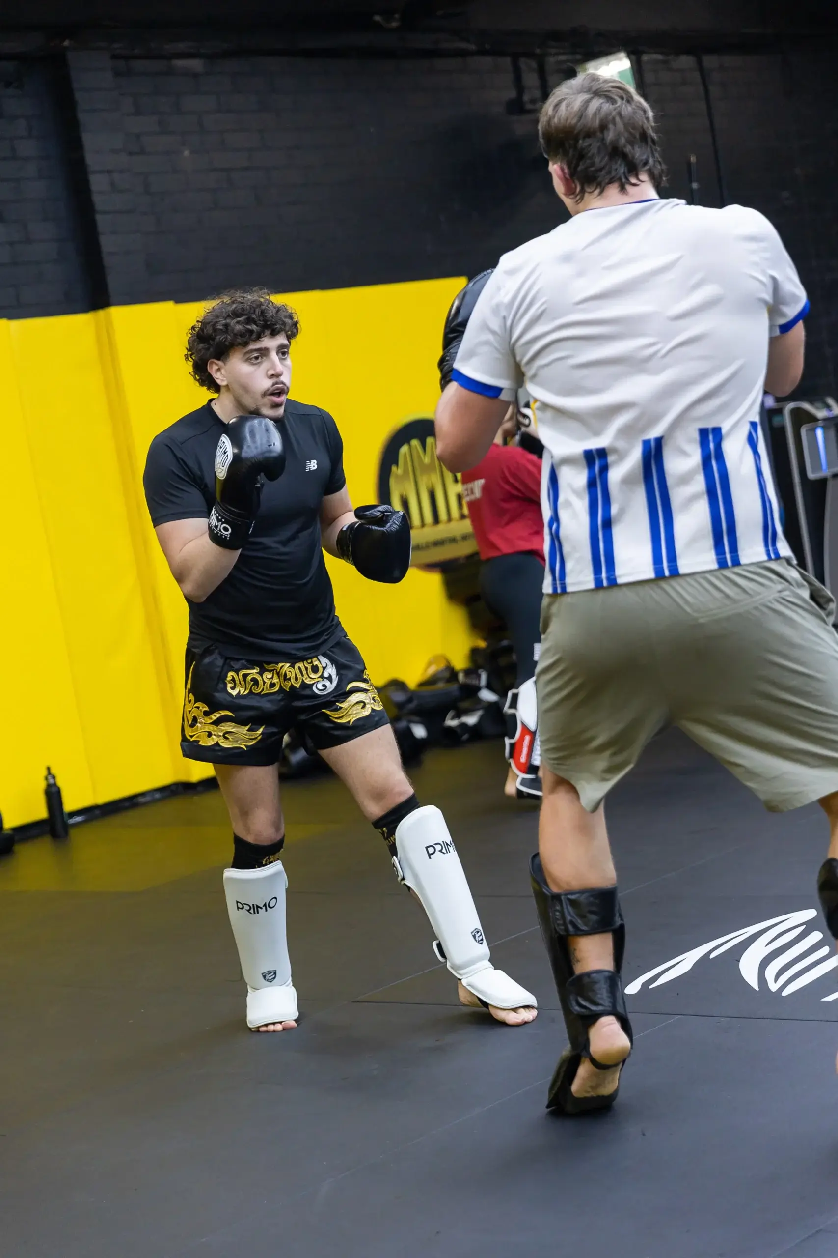 Muay Thai class in progress at MMAC
