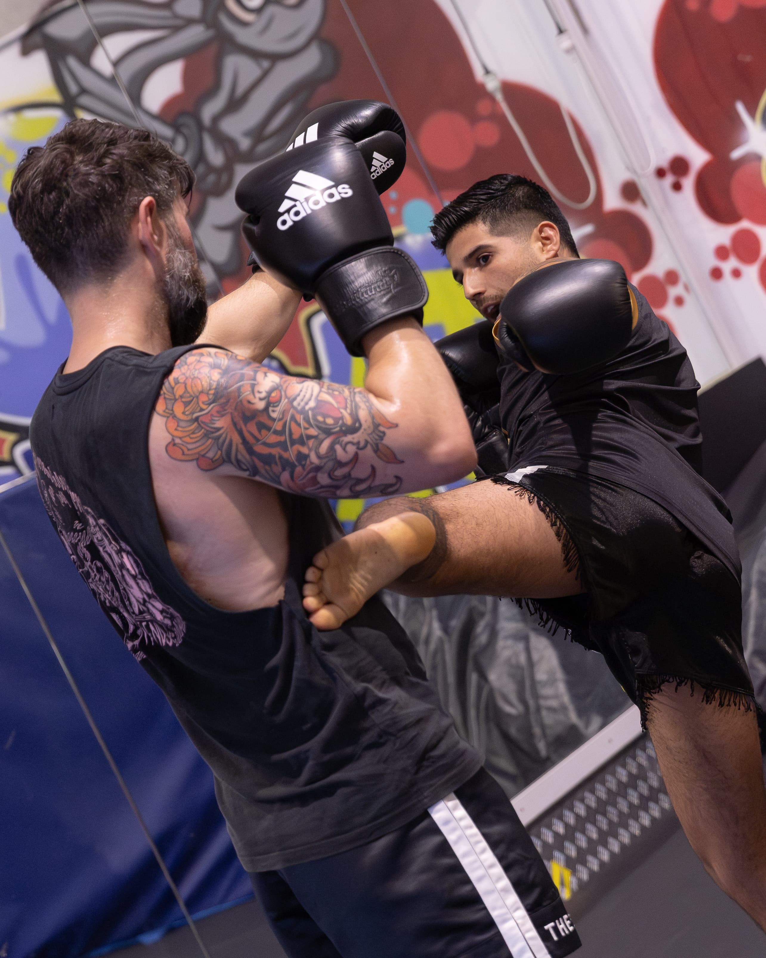 Traditional Muay Thai training session at Marrickville Martial Arts Club featuring students practicing the Art of Eight Limbs with expert instructors